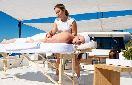 Person getting massage on SANGHA superyacht