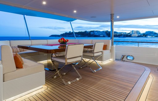 Motor yacht GO dining area on aft deck