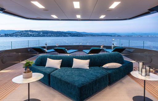 Charter yacht LOEWE alfresco seating in teal