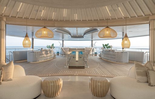 Exterior seating area with Jacuzzi aft onboard charter yacht KISMET