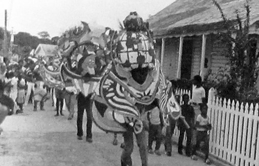 Early 20 Century Junkanoo carnival parade in the street