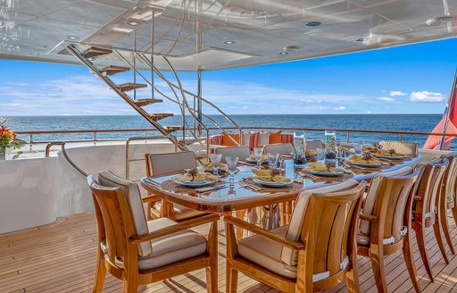 al fresco dining area on the upper deck aft of luxury yacht AVALON 