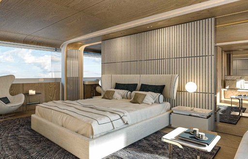 Master cabin onboard charter yacht ALLURIA, central berth facing forward with seating and a large window in the background