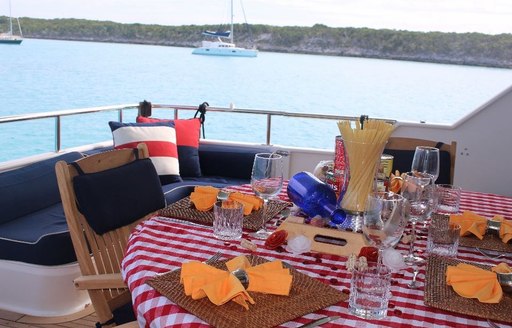 An alfresco dining option on board superyacht Kelly Anne