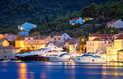 Yachts moored at night in Croatia