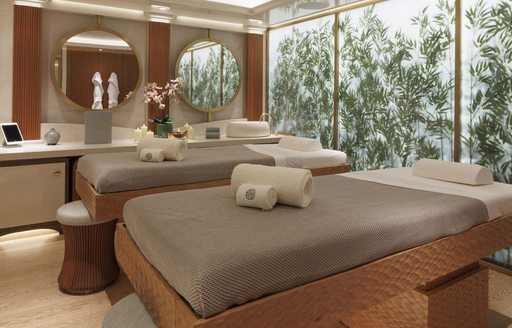 Spa quality massage room onboard charter yacht AHPO with two massage tables centre