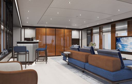 Interiors onboard charter yacht SOLEMATES with wet bar and blue seating