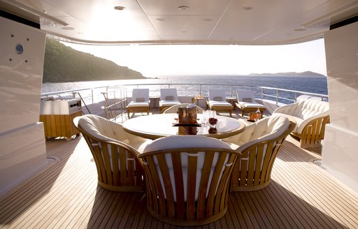 Sun deck of superyacht HARLE with light streaming in 