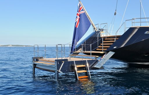 Swim platform with flag hanging above it