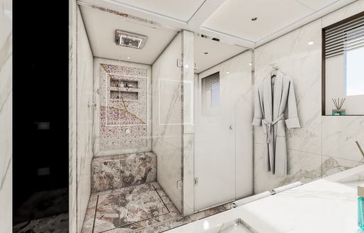 Ensuite facility for a guest cabin onboard superyacht charter ETERNAL SPARK with rain shower and robe hanging adjacent