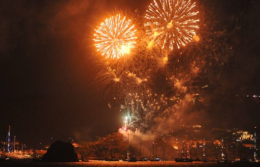 Overview of orange fireworks at the St Barts New Year's Eve celebrations