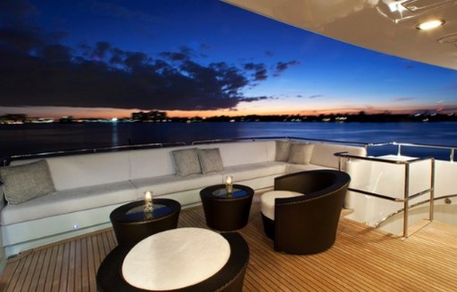 seating area on the sundeck of luxury yacht Milk and Honey as the sun sets