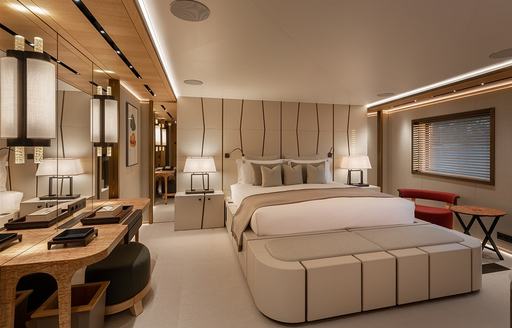 A double berth in a guest cabin onboard charter yacht LA DATCHA