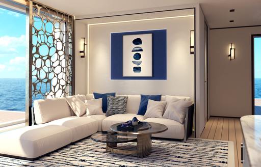 Charter yacht AMALYA interior seating area with white sofa