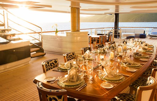 Dining set-up on luxury yacht SOLANDGE