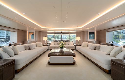Charter yacht O'PARI interior lounge with facing sofas