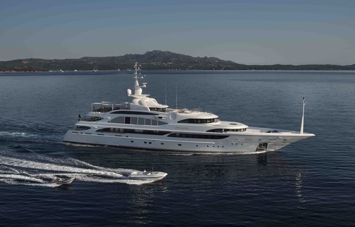 Superyacht 'Mine Games' with tenders and toys around it