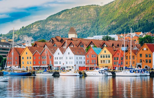 Norwegian houses in pretty harbour in norway