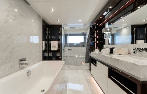 Luxury yacht charter CAPTAIN MORGAN III ensuite with bath tub and sink unit