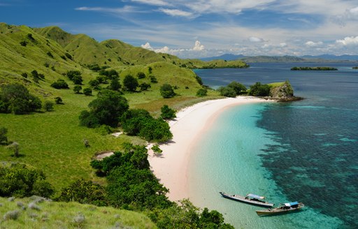 beach in papua new guinea with green backdrop