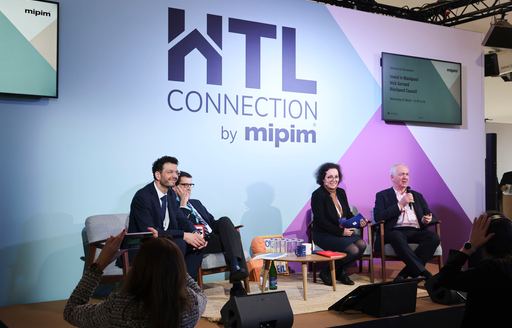 Panel of speaker on stage at MIPIM Cannes