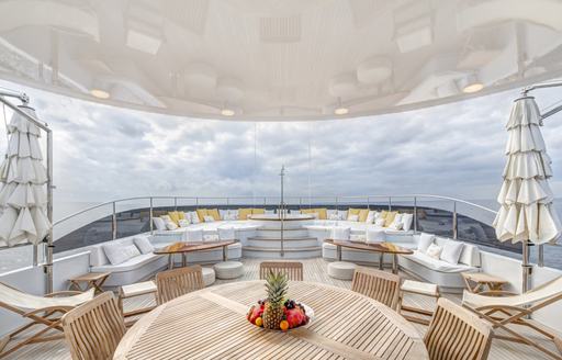 Alfresco dining arrangement on luxury expedition yacht Baron Trenck