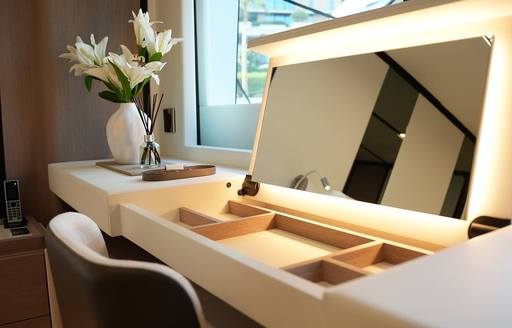 Open vanity unit with lights embedded onboard charter yacht GEULUNEL