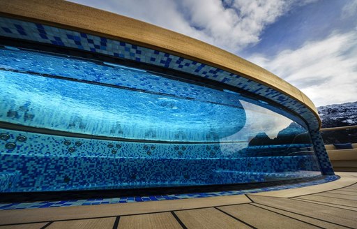 Glass-edge swimming pool on superyacht Flying Fox