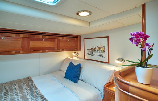 Brightly lit guest cabin onboard sailing yacht charter DARK STAR OF LONDON