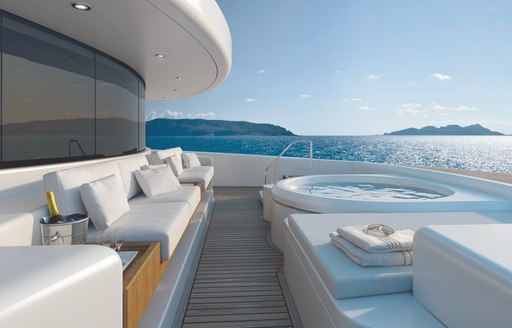 seating, Jacuzzi and sun pads on the foredeck of luxury yacht SOLO