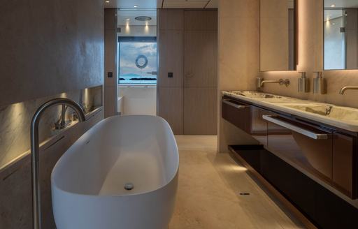 Ensuite onboard charter yacht CANOE CANOE with tub and dual sinks