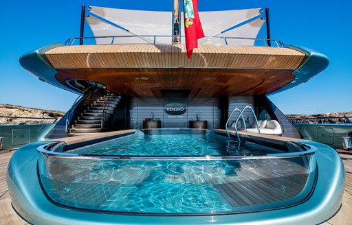 Aft deck swimming pool onboard charter yacht KENSHO