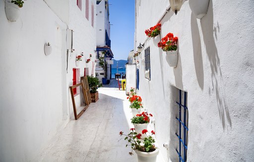 A narrow allow with white buildings in Turkey