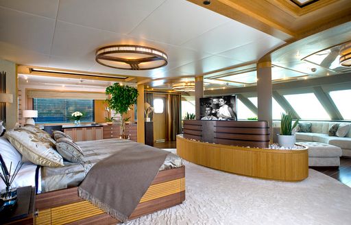 master suite with raised bed and lounge area on board charter yacht ‘Indian Empress’ 