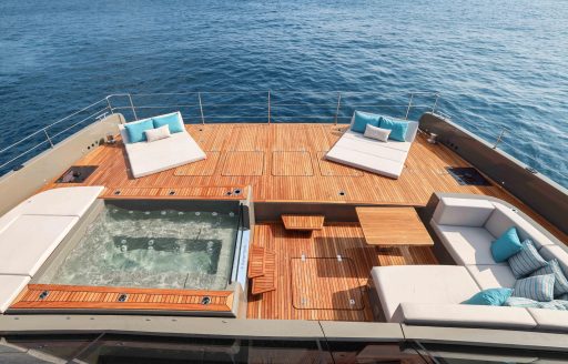 Charter yacht AMITATU deck Jacuzzi and sun pads