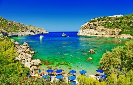 pretty green bay and sparkling clear cove in greece