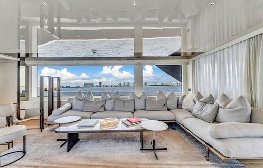 Main salon lounge and large sofa onboard superyacht charter NOTYNOG