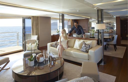 Charter yacht IMPERIAL PRINCESS BEATRICE main salon with charter guests