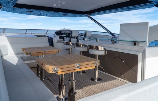 Charter yacht NIGORA exterior dining setup