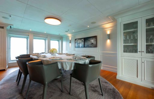 Interior dining area onboard charter yacht BRAVADO