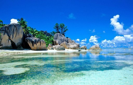 idyllic beach with white sand and crystal waters in South East Asia