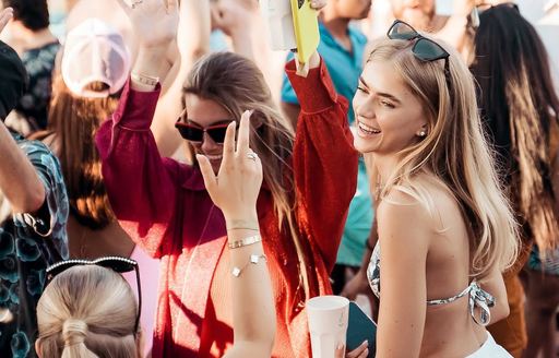 Charter guests dancing at Nikki Beach Dubai