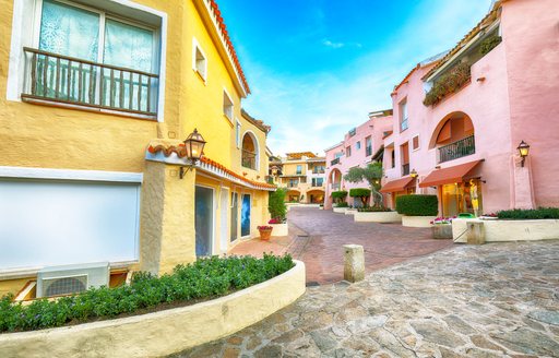 Porto Cervo buildings in yellow and pink