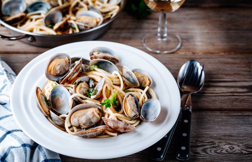 Spaghetti and shellfish meal at Italian restaurant in Naples