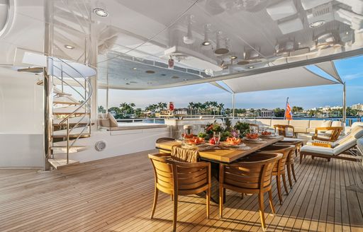 Charter yacht NOVERRA alfresco dining table and seats