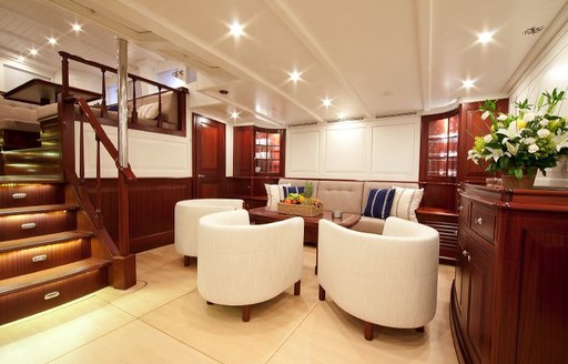 lounge area in bright and airy lower salon on board luxury yacht ANNAGINE 