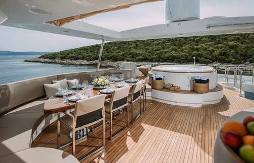 Charter yacht ARTEMY exteriors with seating and Jacuzzi