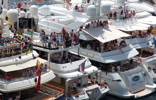 superyachts line up to catch the action of the Monaco Grand Prix in track-side berths