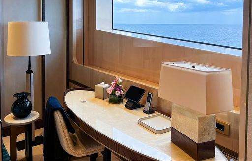 Charter yacht AMOR A VIDA desk under window