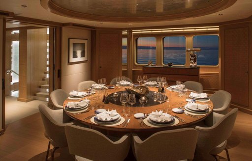 dining salon with circular table on board luxury yacht SAMADHI 